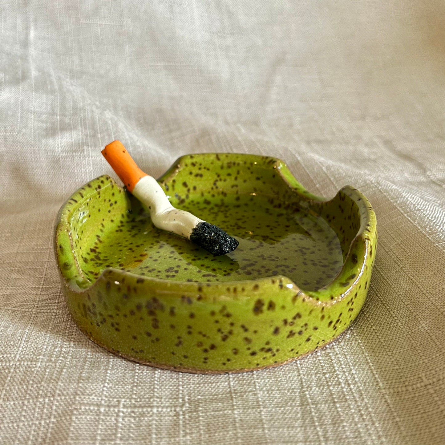 used ashtray - green