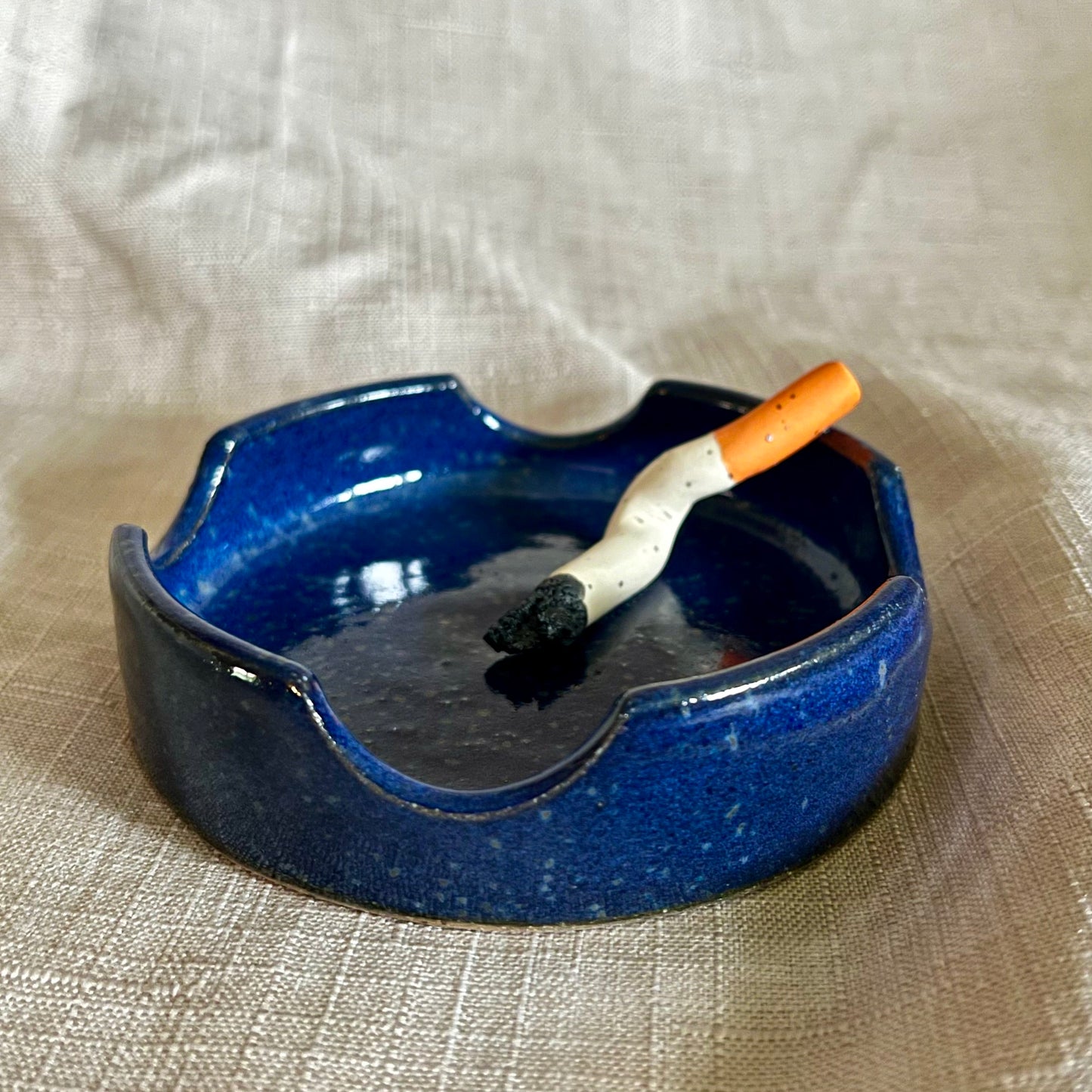 used ashtray - dark blue